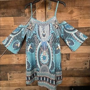 Beautiful dress. NWT. Can be worn alone or paired with leggings.